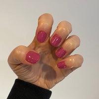 Berry kiss is a dark pink dip powder colour made here in Australian with premium finely milled dip powder for lasting nails when using the pro liquids. perfect for natural nails for a timeless manicure.