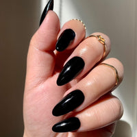 Black Nails using Black Orlov dip powder on customer nails using DIPD