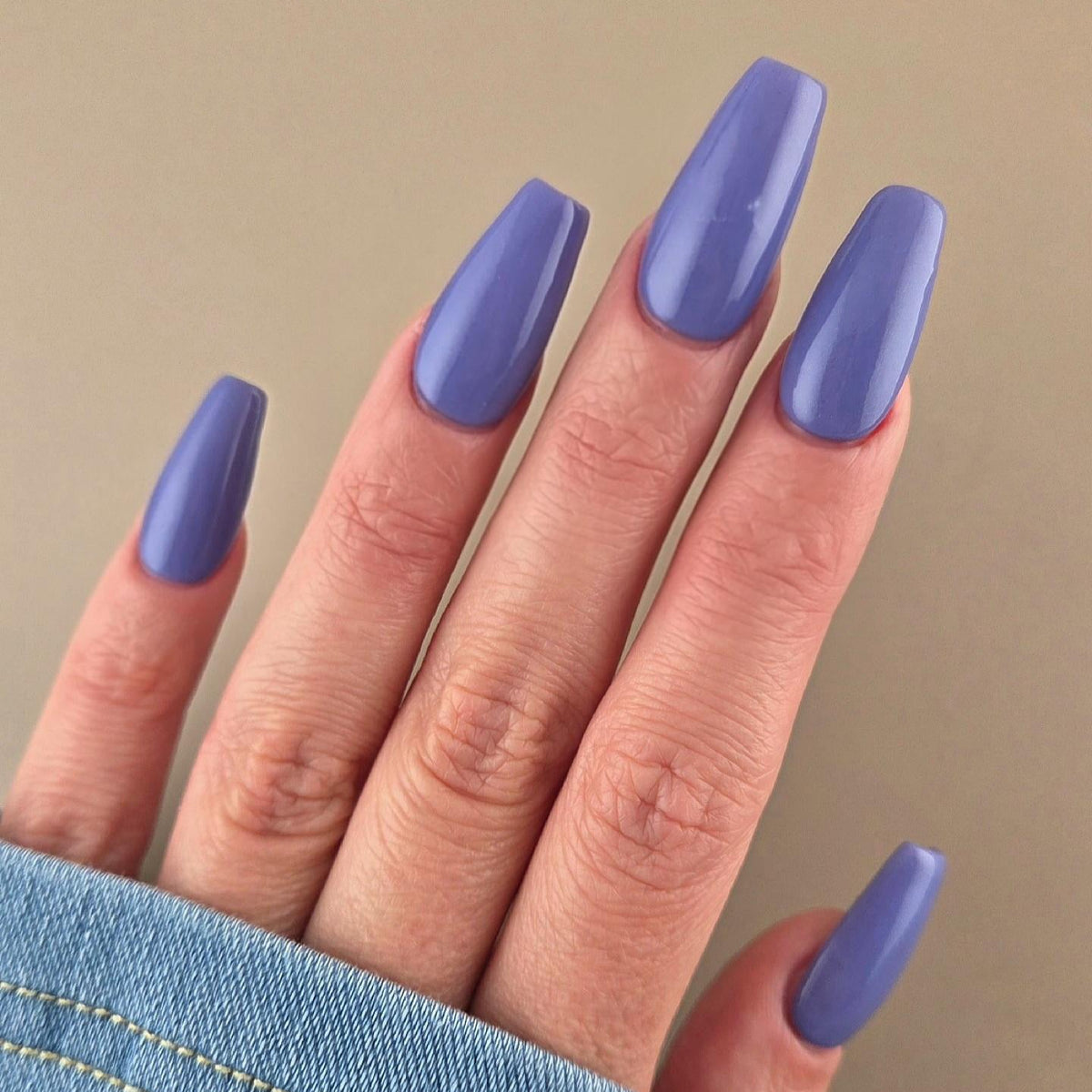 Purple Blue dip nail result on long nails sing the DIPD Nails system.