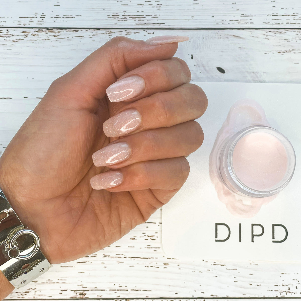 bestselling champagne dip powder colour on natural nails using DIPD Nails
