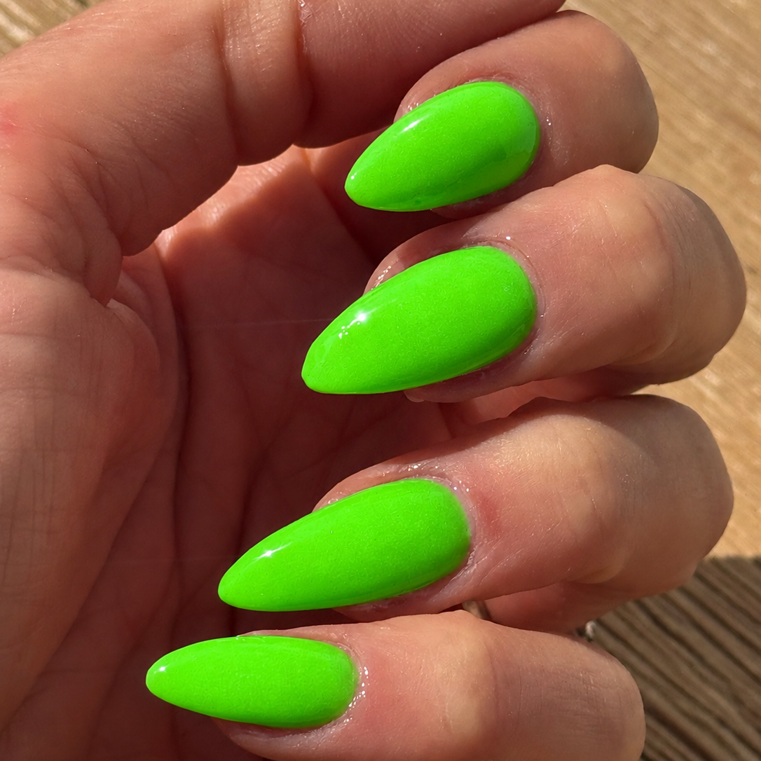 High Voltage Lime green neon dip nail colour on natural nails