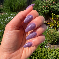 Iris mauve purple dip powder glitter on natural nails.