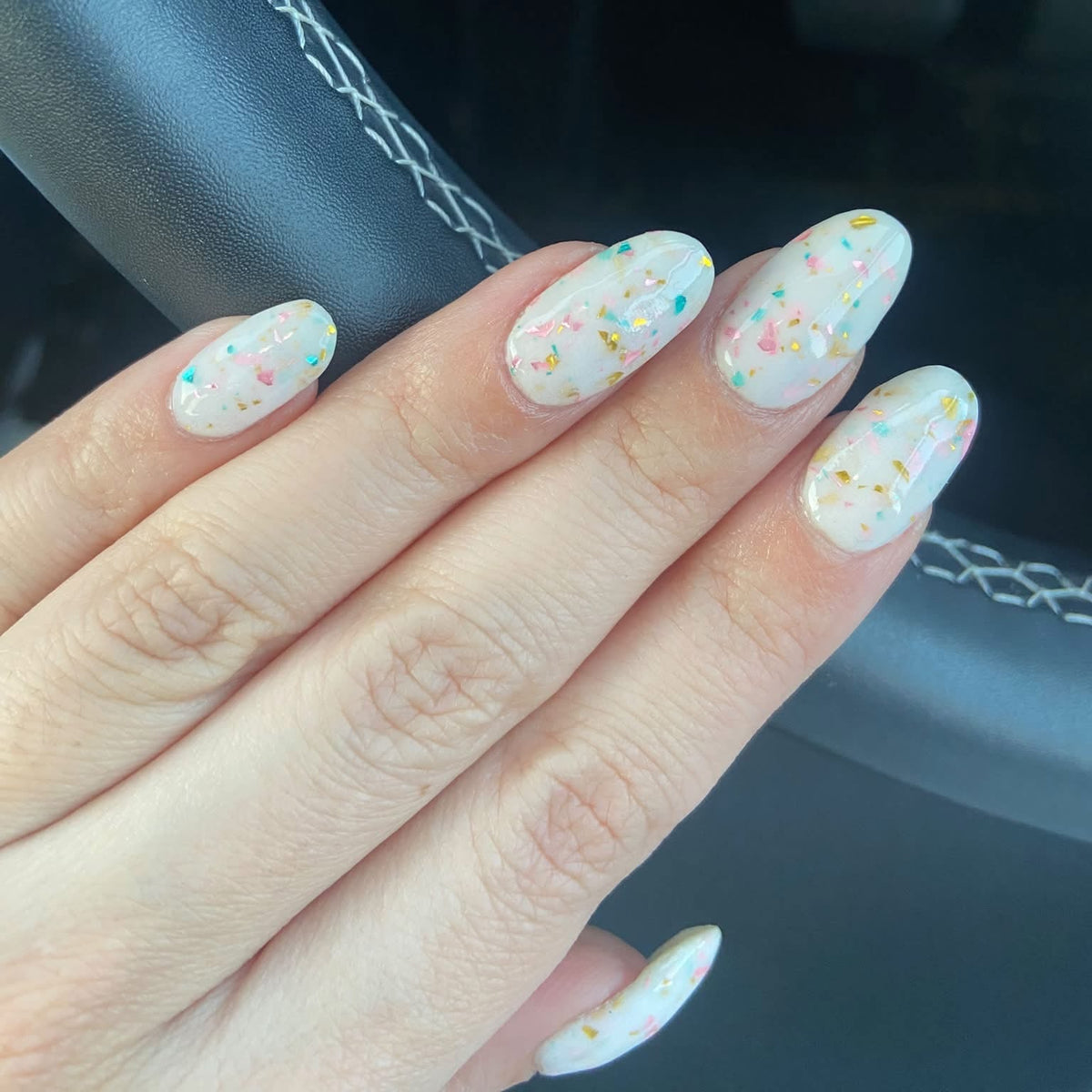 Milk Bloom from Confetti Milk collection from DIPD Nails on natural nails
