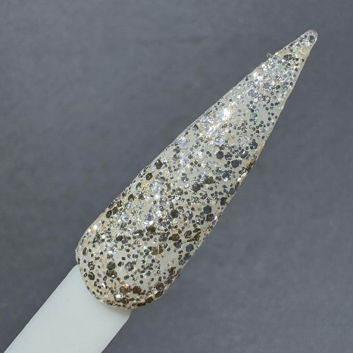 Platinum Poppy Glitter nail swatch