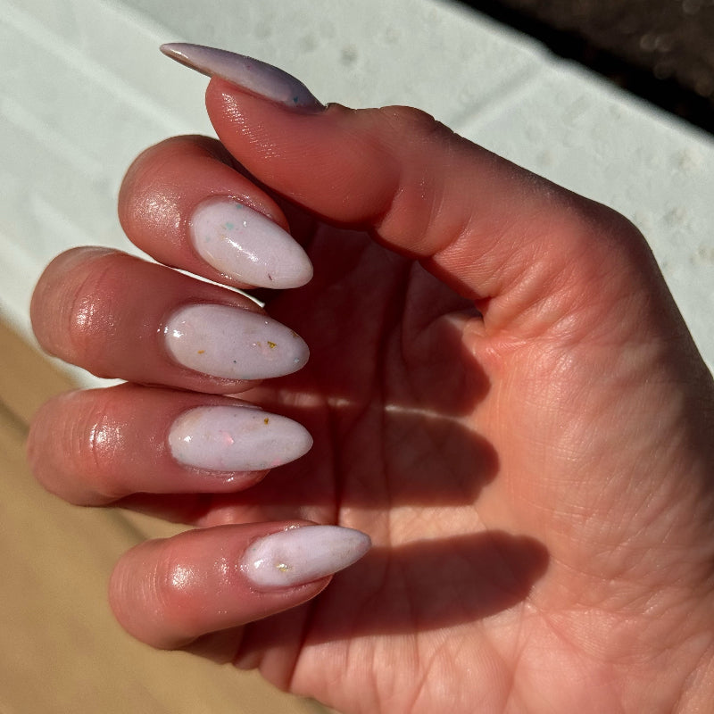 Violet Bloom from the Confetti Milk collection by dipd nails