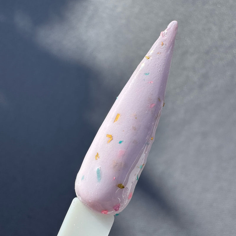 Violet bloom from confetti milk collection for DIPD on stiletto swatch