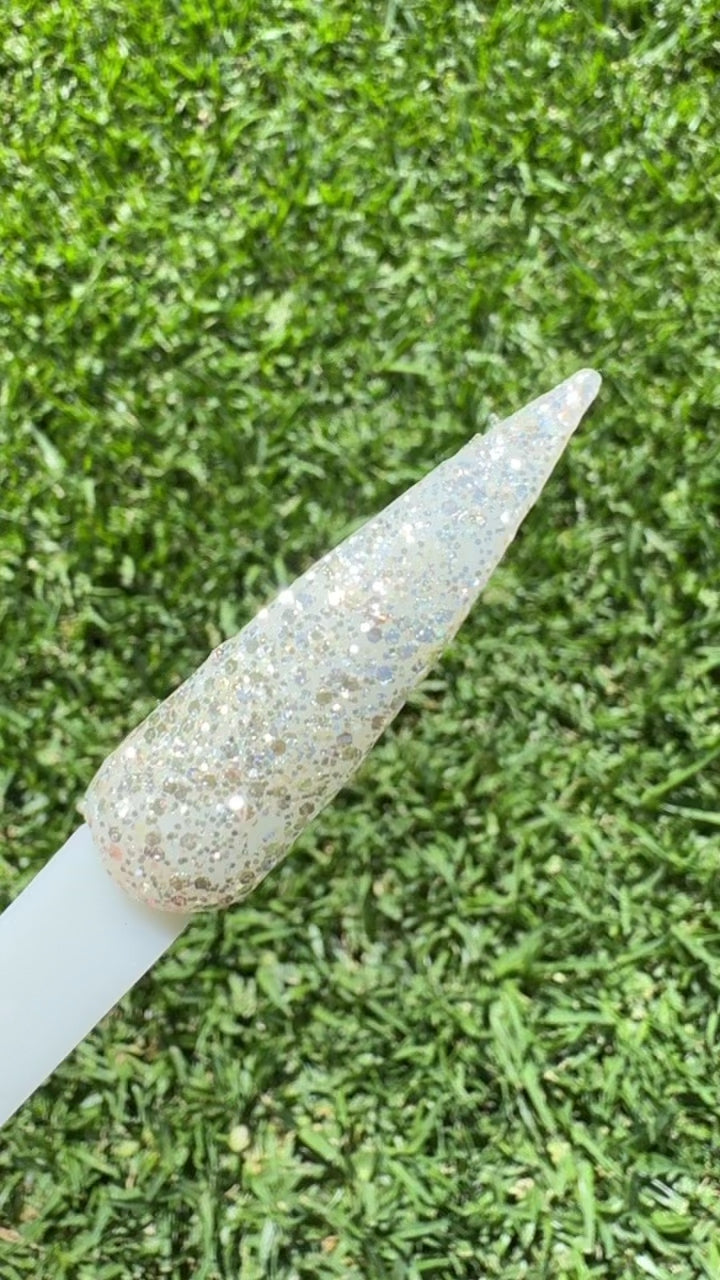 Platinum Poppy Glitter Dip Powder on Swatch for DIPD Nails