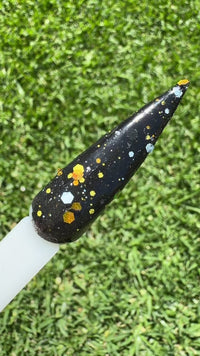 Gothic Glitter Dip Nail powder is black and glitter on a swatch video